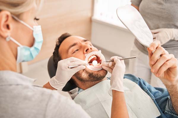 A Dentist Explains How Preventive Dentistry Can Avoid Cavities 